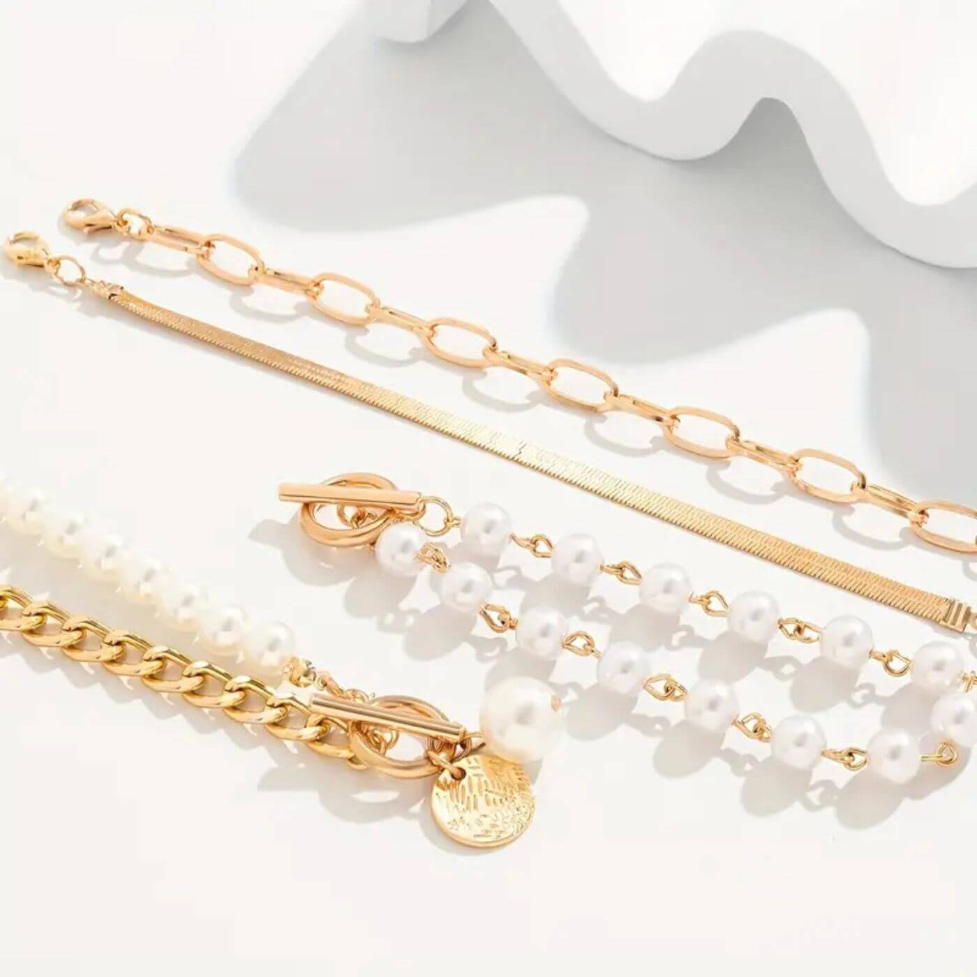 Elegant Pearl Gold Bracelet Set