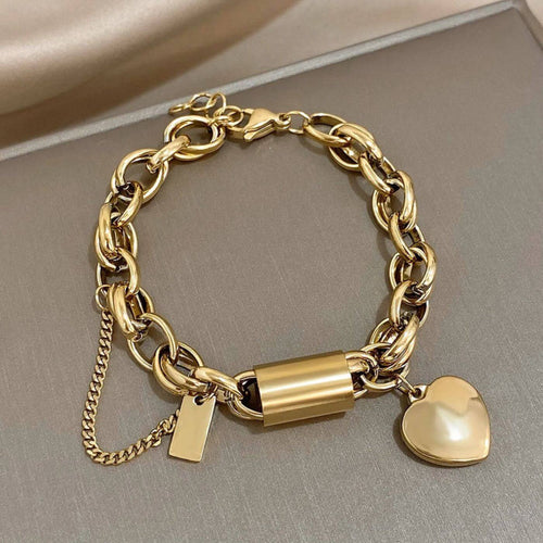 Elegant Pearl Heart Charm Bracelet