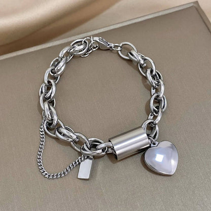 Elegant Pearl Heart Charm Bracelet