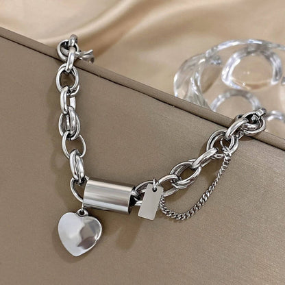 Elegant Pearl Heart Charm Bracelet