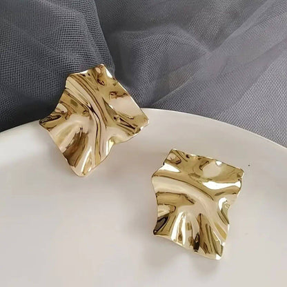 Elegant Sculpted Gold Stud Earrings