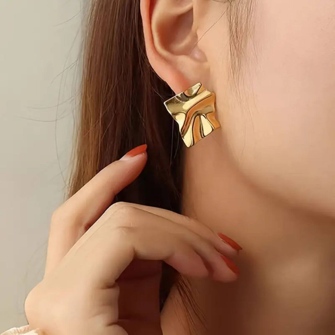 Elegant Sculpted Gold Stud Earrings