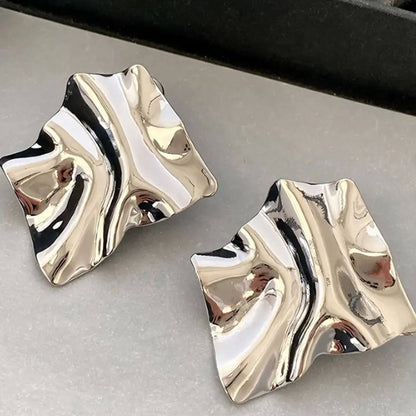 Elegant Sculpted Gold Stud Earrings