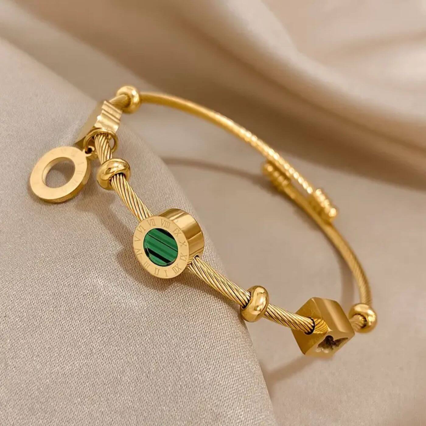 Emerald Accent Gold Charm Bracelet