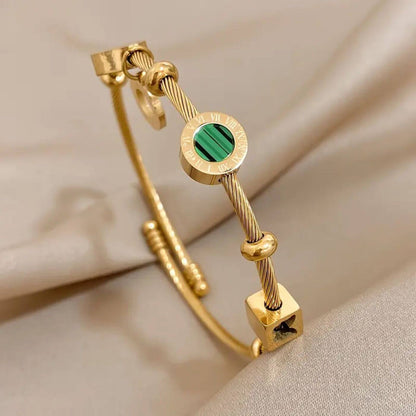 Emerald Accent Gold Charm Bracelet