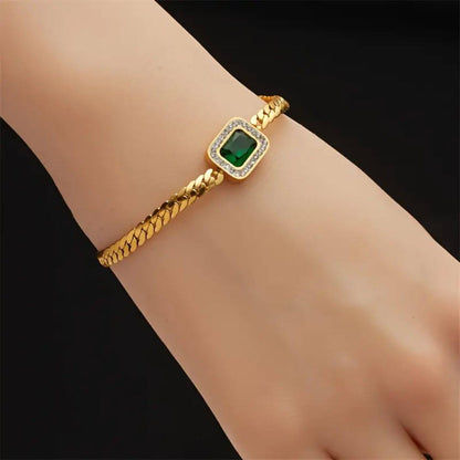 Exquisite Gold Emerald Charm Bracelet