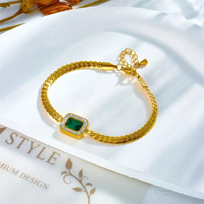 Exquisite Gold Emerald Charm Bracelet
