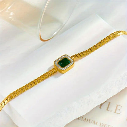 Exquisite Gold Emerald Charm Bracelet