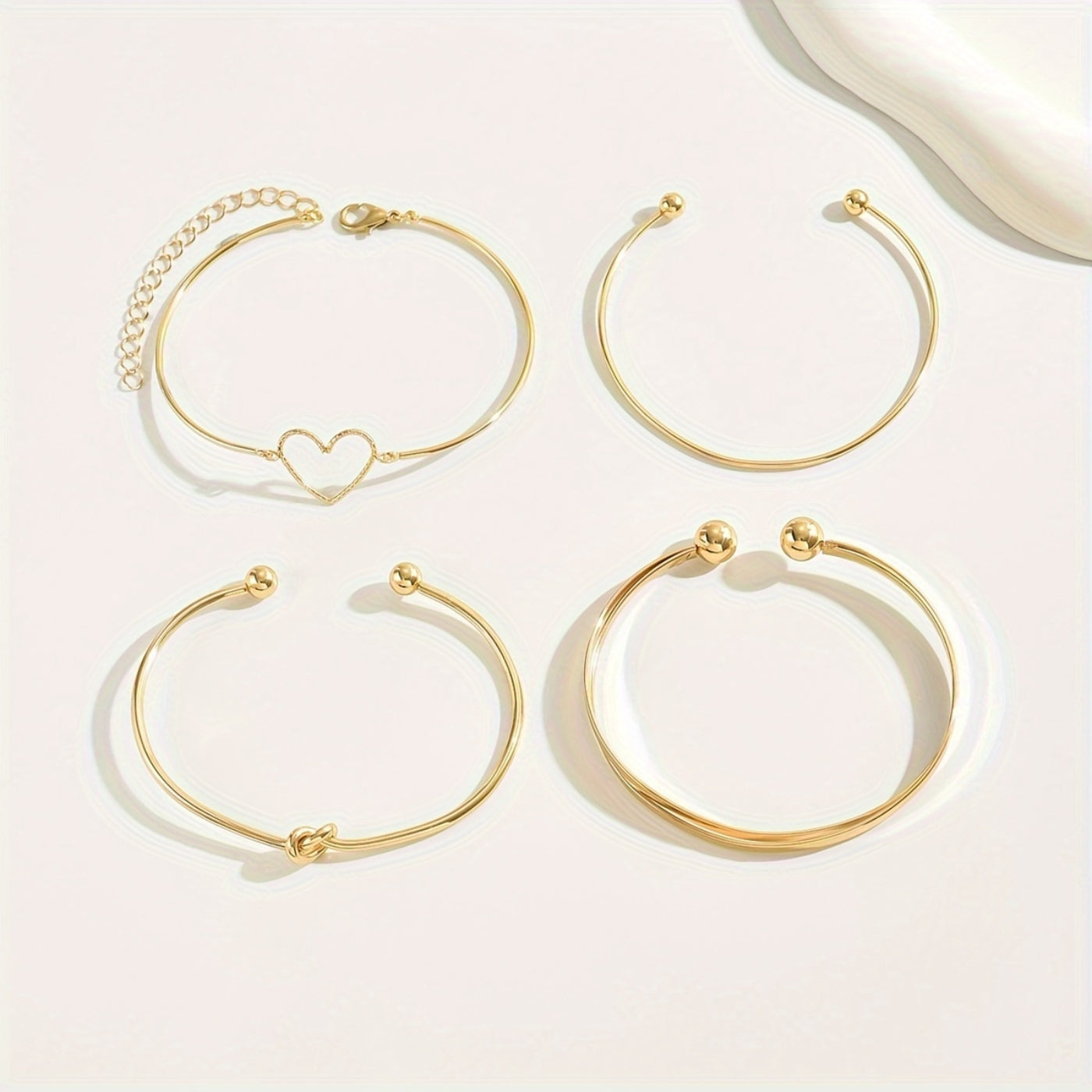 Golden Heart Charm Bangle Set