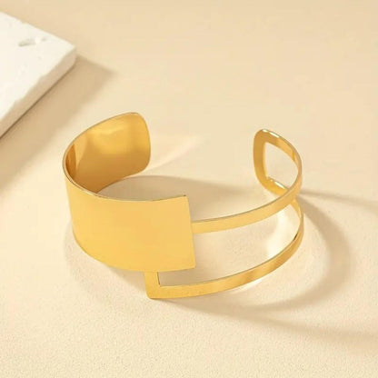 Refined Geometric Gold Statement Bracelet