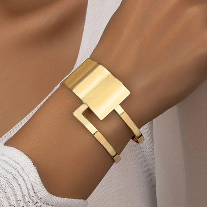 Refined Geometric Gold Statement Bracelet