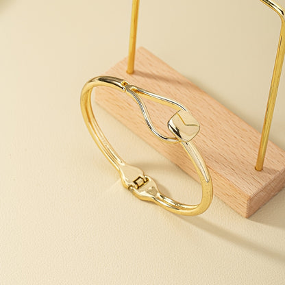 Refined Gold Loop Wrist Bangle