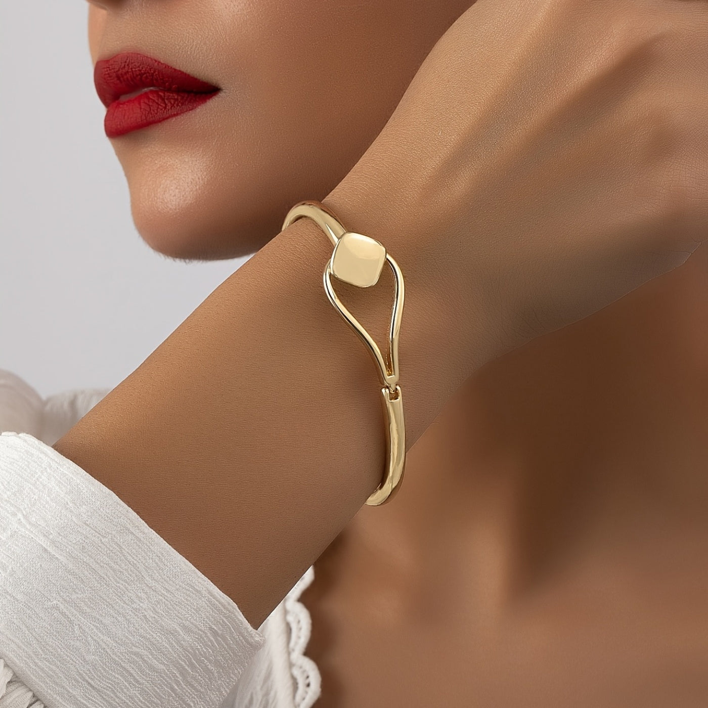 Refined Gold Loop Wrist Bangle