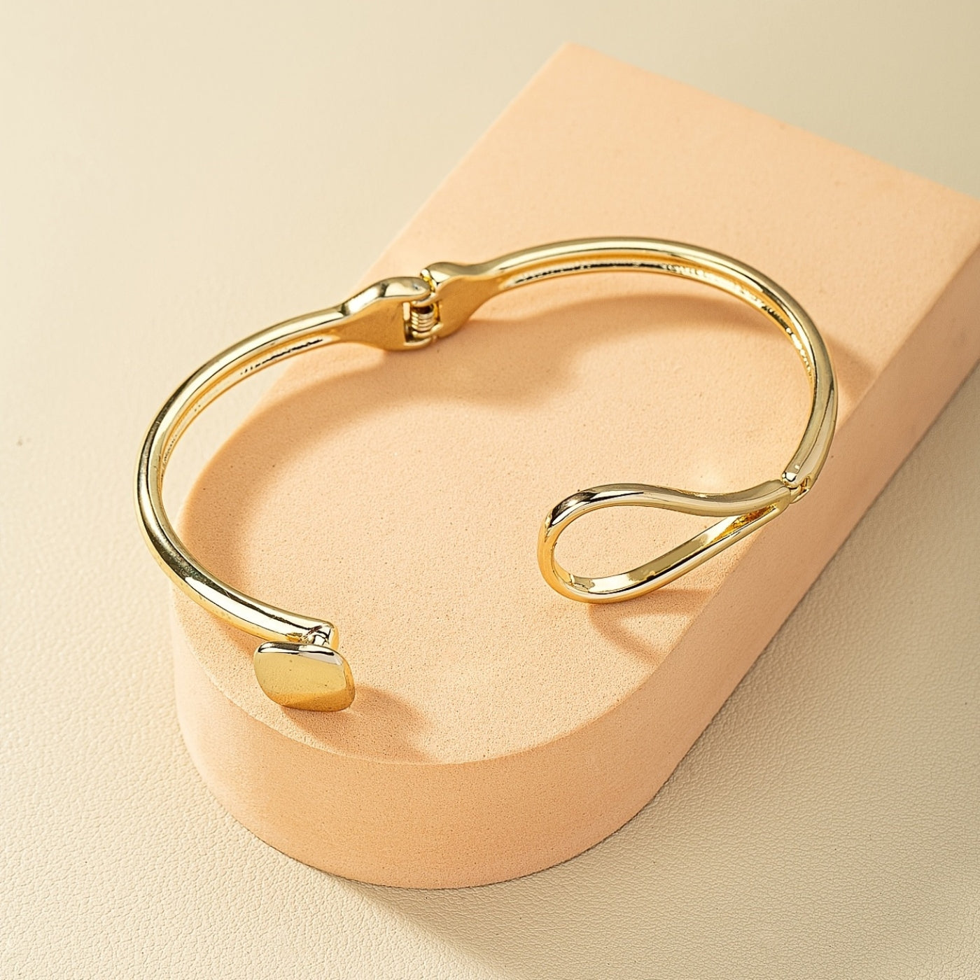 Refined Gold Loop Wrist Bangle