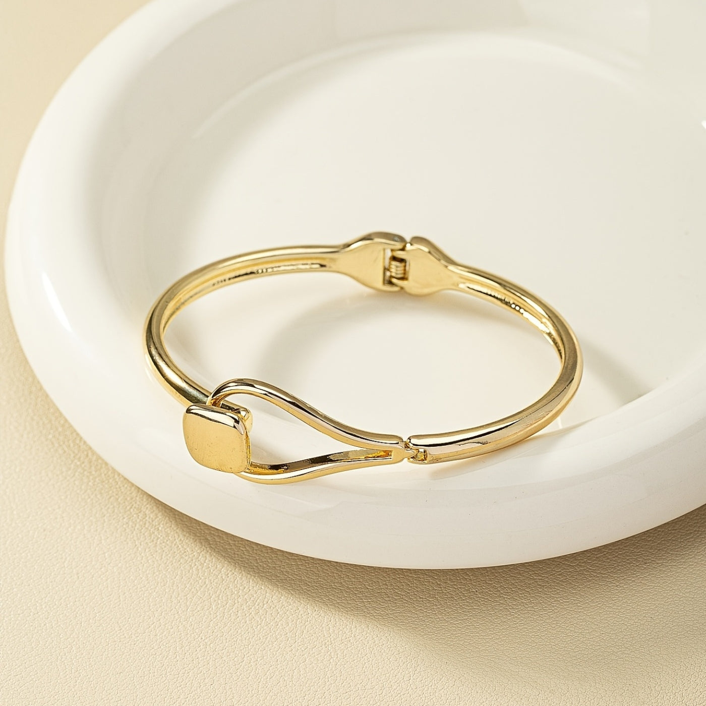 Refined Gold Loop Wrist Bangle