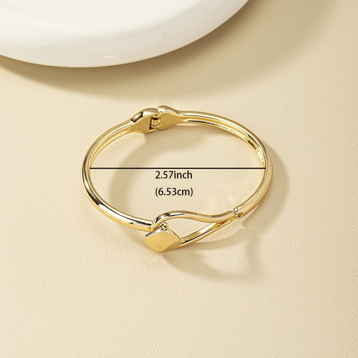 Refined Gold Loop Wrist Bangle