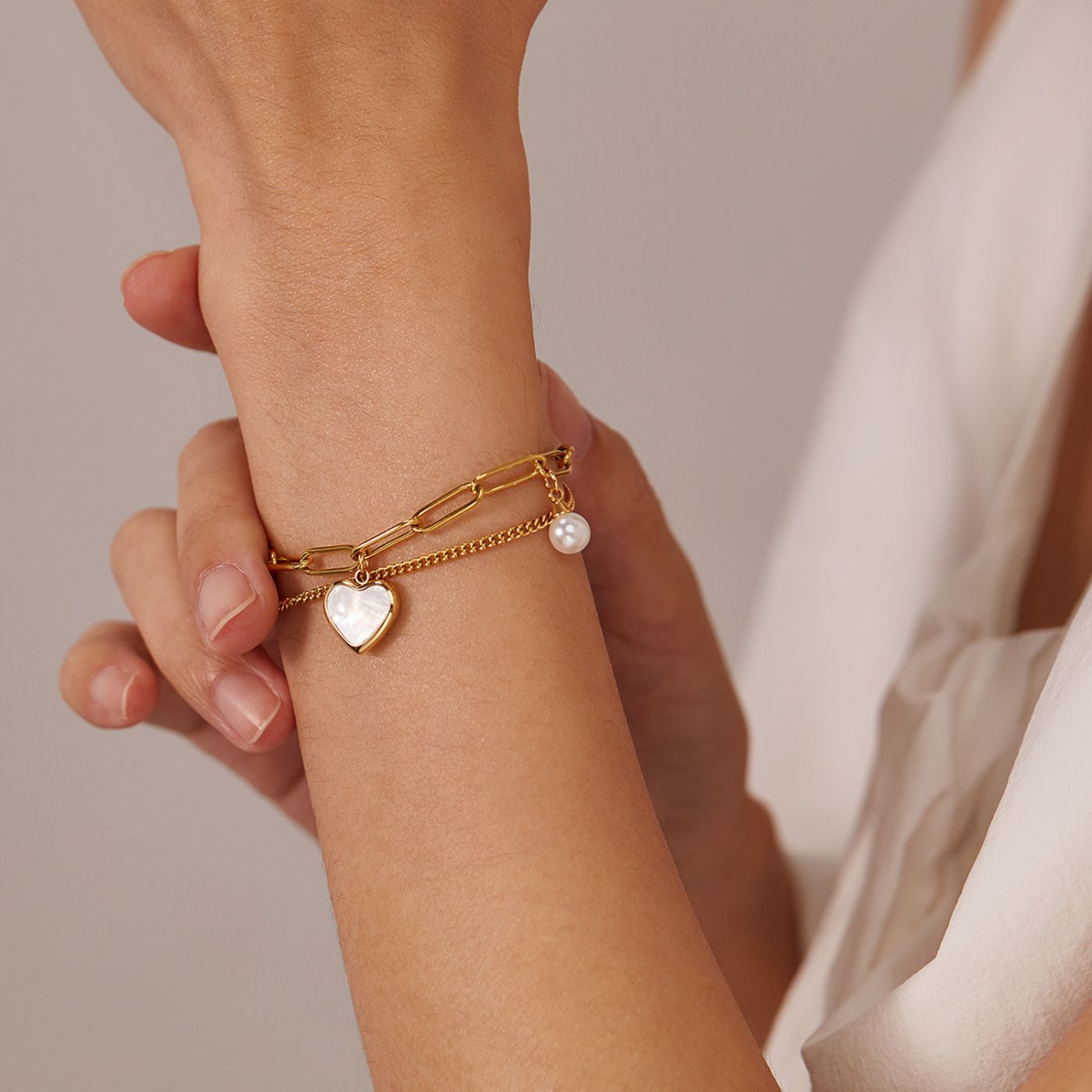 Refined Pearl and Heart Link Bracelet