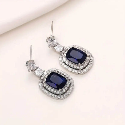 Royal Sapphire Halo Drop Earrings